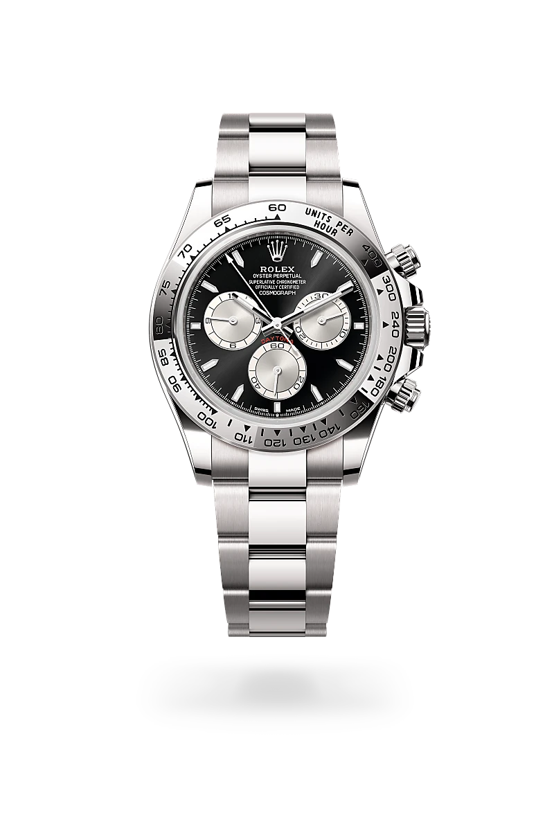 Rolex Cosmograph Daytona in 18 ct white gold with Bright black and steel dial, Fixed, with engraved tachymetric scale, in 18 ct white gold bezel, and Oyster, three-piece solid links bracelet