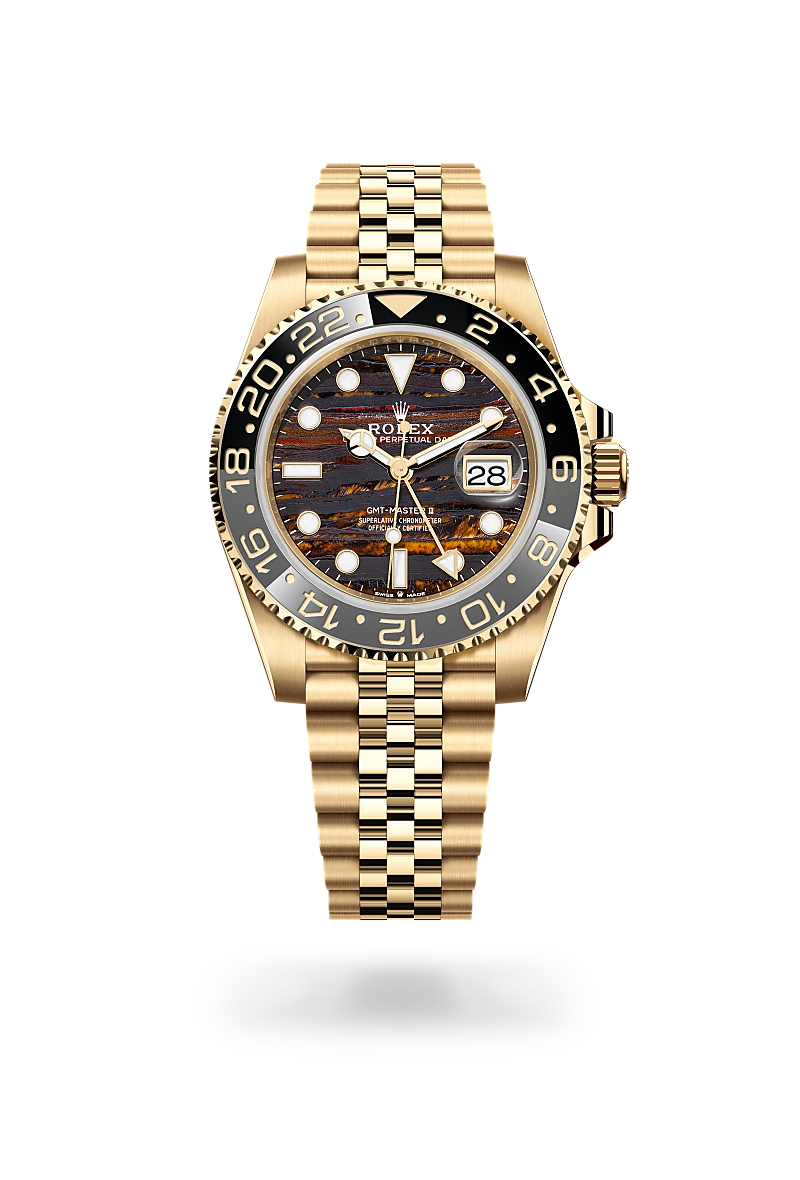 Rolex GMT-Master II in 18K黃金 with 鐵虎眼石 dial, 雙向旋轉24小時刻度外圈；灰黑雙色Cerachrom陶質字圈，設鑄模數字及刻度 bezel, and 紀念型（Jubilee），五格鏈節 bracelet