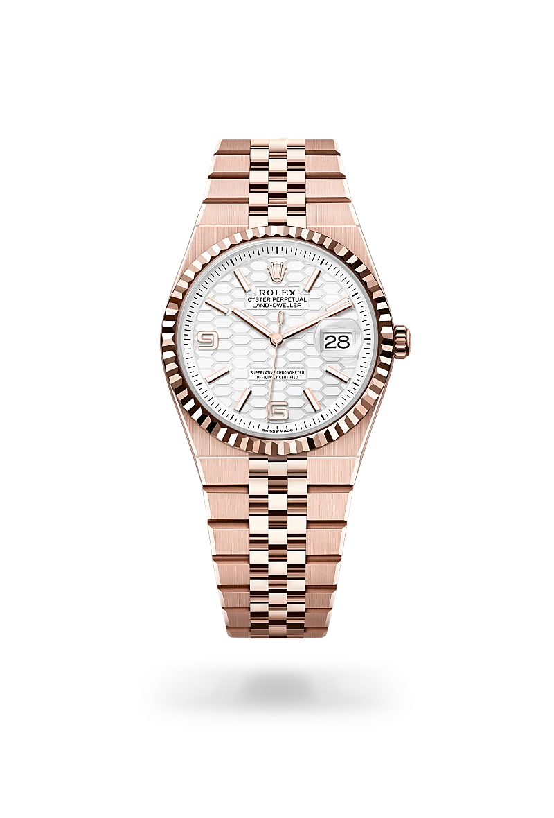 Rolex Land-Dweller 36 in 18 ct Everose gold with Intense white, honeycomb motif dial, Fluted bezel, and Flat Jubilee, five-piece solid links bracelet