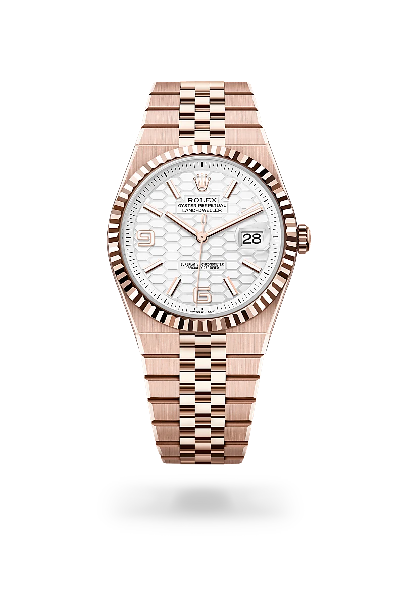 Rolex Land-Dweller 40 in 18 ct Everose gold with Intense white, honeycomb motif dial, Fluted bezel, and Flat Jubilee, five-piece solid links bracelet