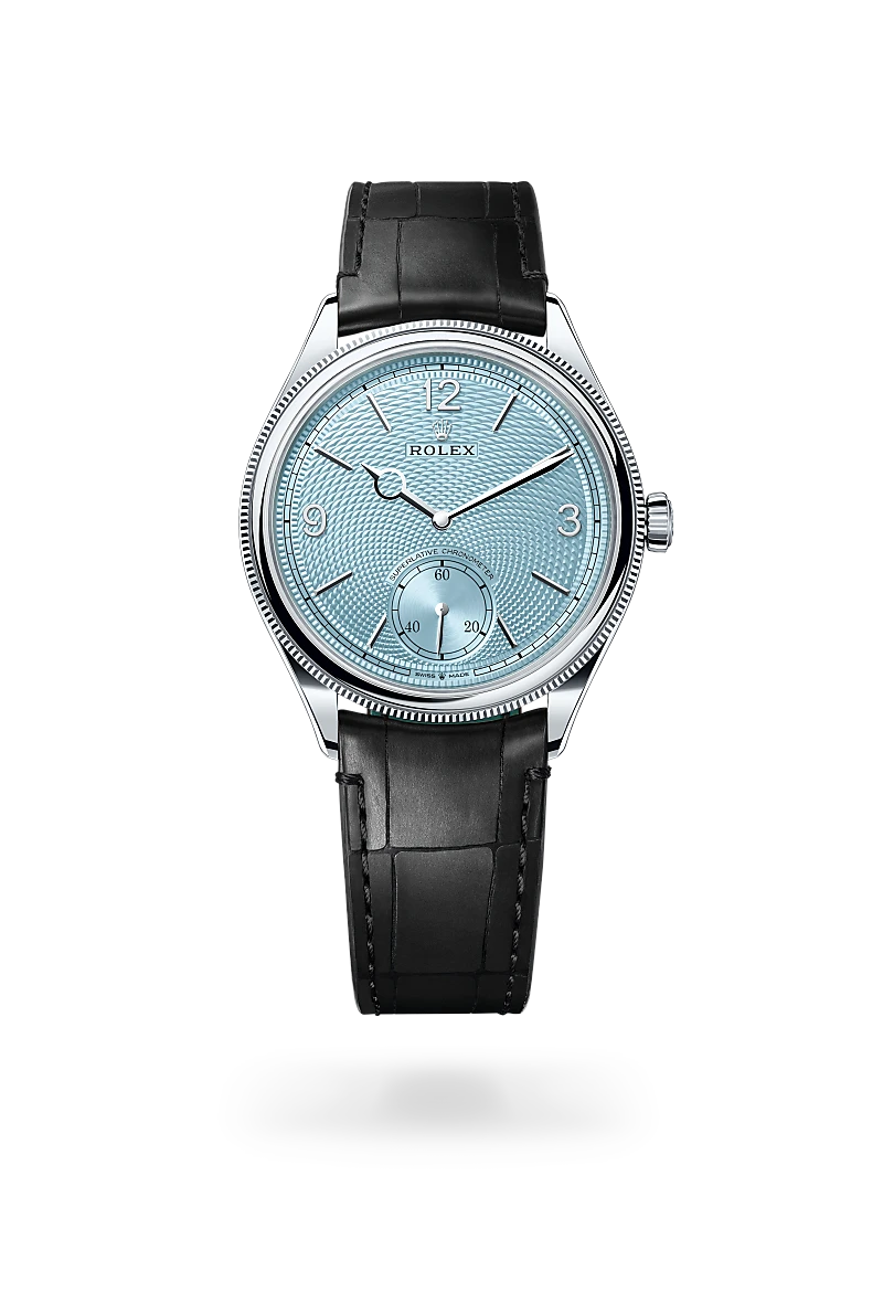 Rolex 1908 in Platinum with Ice blue, rice-grain motif dial, Domed and fluted bezel, and Leather strap bracelet