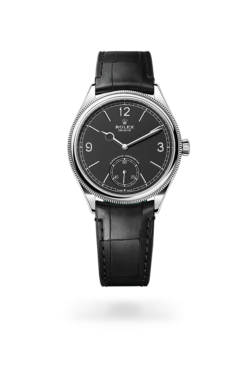 Rolex 1908 in 18 ct white gold with Intense black dial, Domed and fluted bezel, and Leather strap bracelet